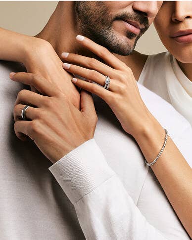 Man and woman wearing David Yurman jewelry.