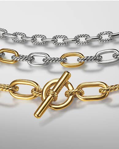 Three David Yurman Madison chain necklaces in gold, silver and mixed metals.