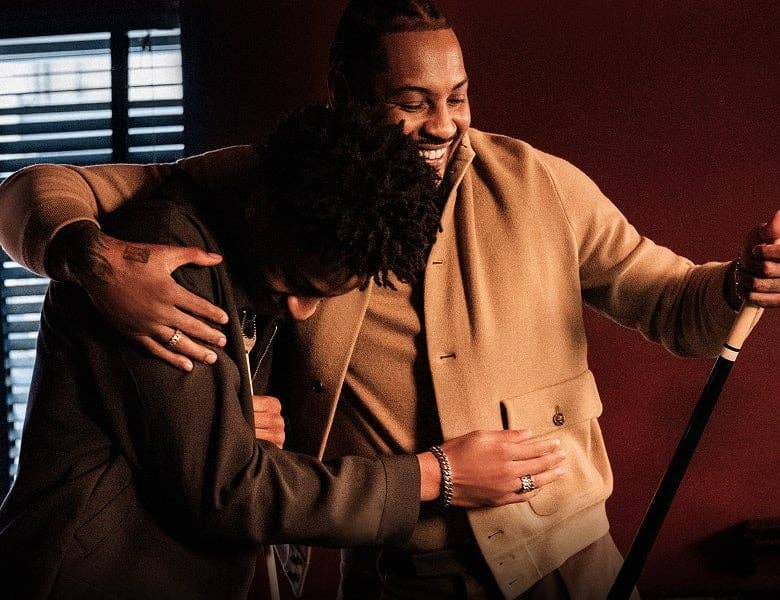 Carmelo Anthony and his son playing pool.
